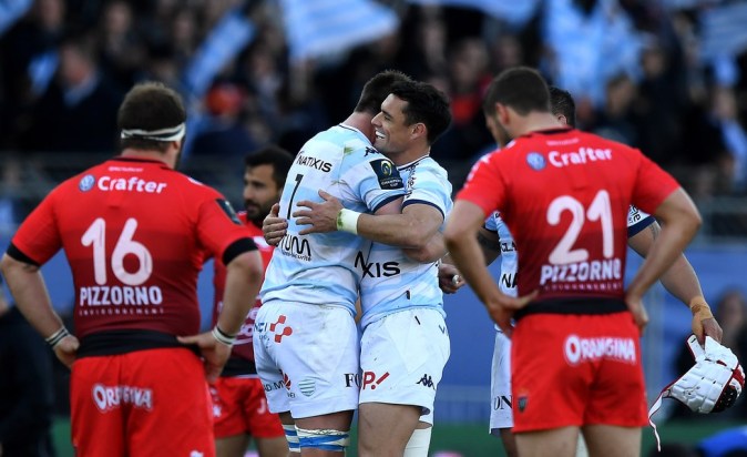 Racing Metro 92 South African flanker Bernard Le Roux (C-L) and Racing Metro 92 New Zealand flyhalf Dan Carte (C-R) react at the end of the European Rugby Champions Cup match between Racing Metro 92 and Toulon at Yves du Manoir stadium in Colombes on April 10, 2016. AFP PHOTO / FRANCK FIFEFRANCK FIFE/AFP/Getty Images
